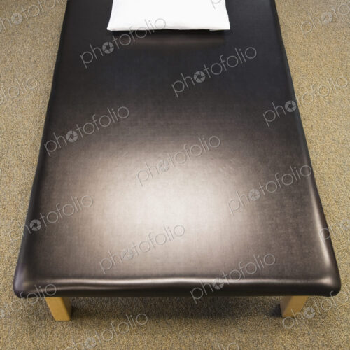 High angle view of leather massage or treatment couch.