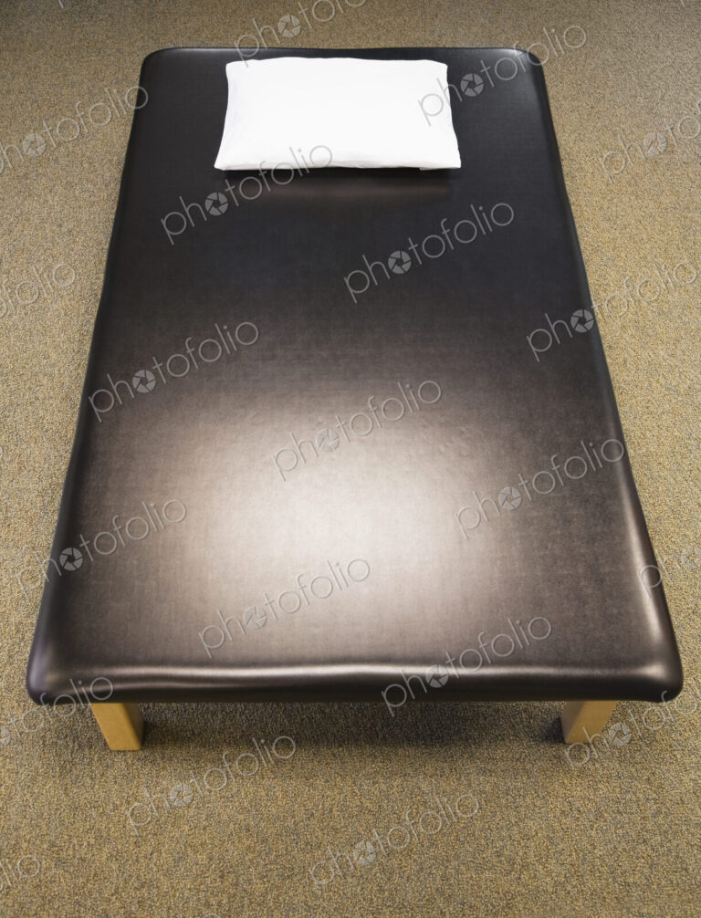 High angle view of leather massage or treatment couch.