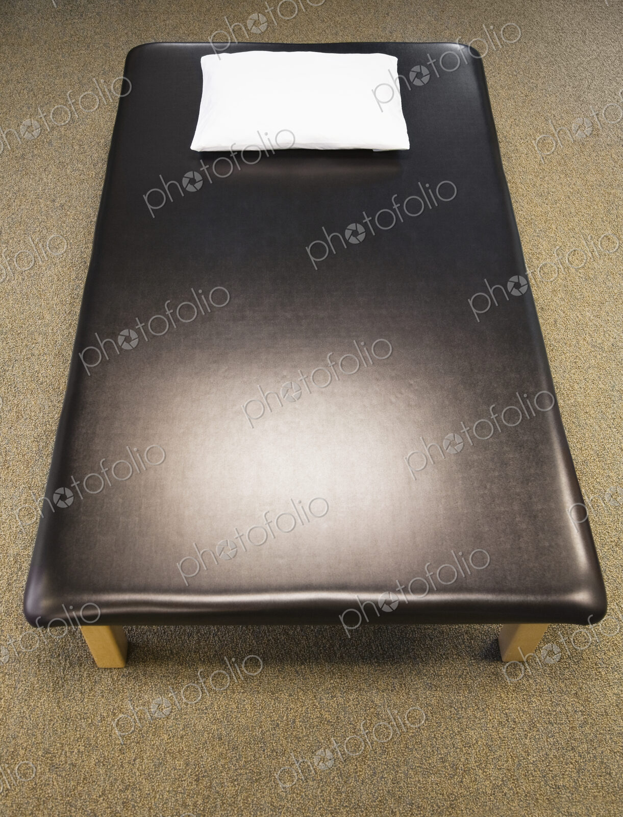 High angle view of leather massage or treatment couch.