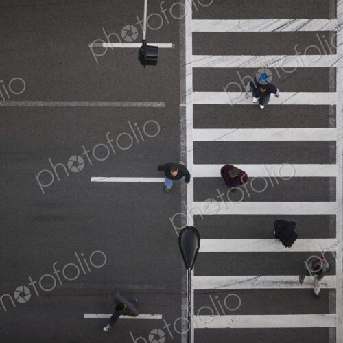 High angle view of pedestrians crossing street High angle view of pedestrians crossing street