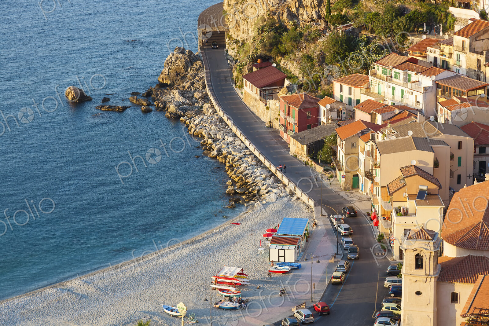 High angle view of seaside town with sandy beach on the Mediterranean coast.