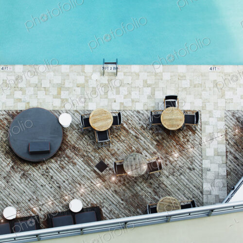 High angle view of tables at hotel swimming pool High angle view of tables at hotel swimming pool
