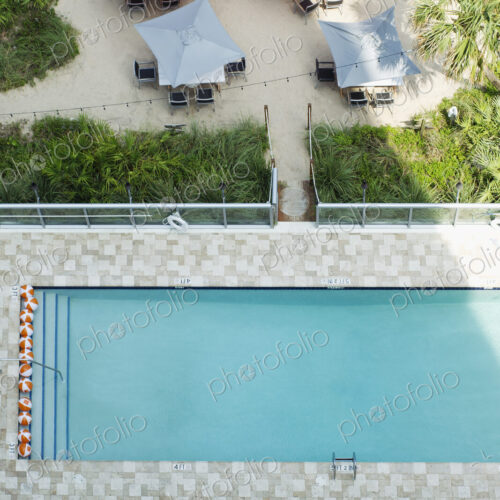 High angle view of tables at hotel swimming pool High angle view of tables at hotel swimming pool
