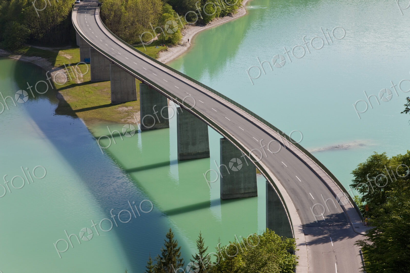 High angle view of tall road bridge crossing dam