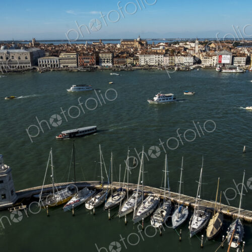 High angle view of the Canale Grande in Venice, Veneto, Italy, with gondolas moored in… High angle view of the Canale Grande in Venice, Veneto, Italy, with gondolas moored in…