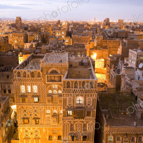High angle view over rooftops of buildings in the old city of Sana'a in Yemen. A… High angle view over rooftops of buildings in the old city of Sana'a in Yemen. A…