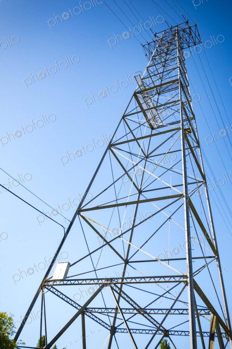 High transmission tower, a metal structure, low angle view of the structure.