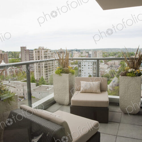 Highrise apartment balcony overlooking city Highrise apartment balcony overlooking city