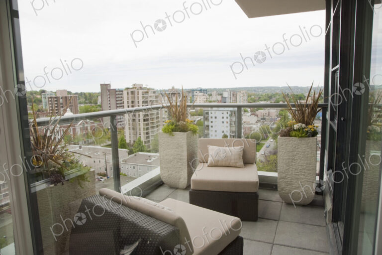 Highrise apartment balcony overlooking city