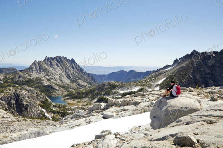 Hikers admiring mountains in remote landscape