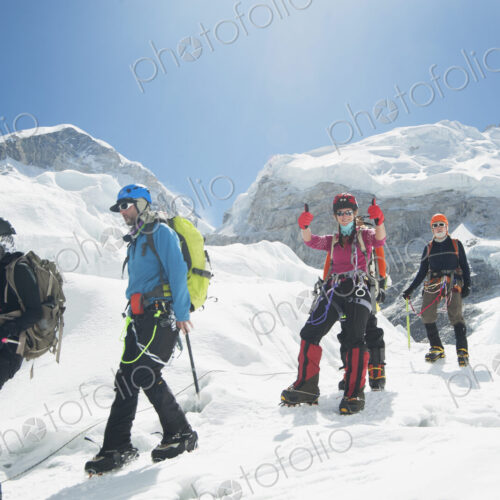 Hikers backpacking on mountain, Everest, Khumbu region, Nepal Hikers backpacking on mountain, Everest, Khumbu region, Nepal