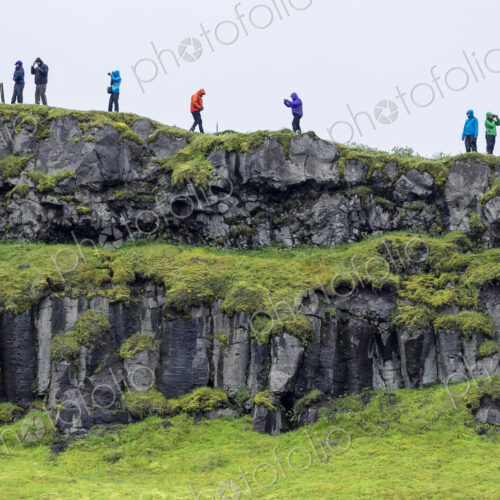 Hikers on the cliffs near Gullfoss