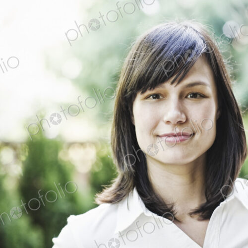 Hispanic woman in the garden of her home. Hispanic woman in the garden of her home.
