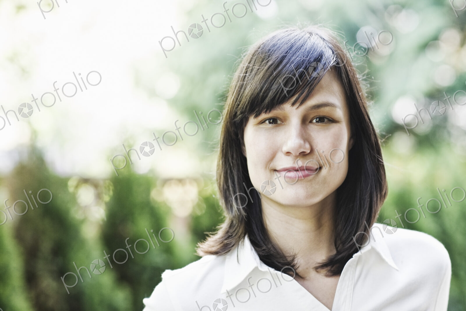 Hispanic woman in the garden of her home.
