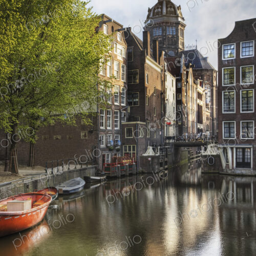 Historic Buildings and Canal in Amsterdam