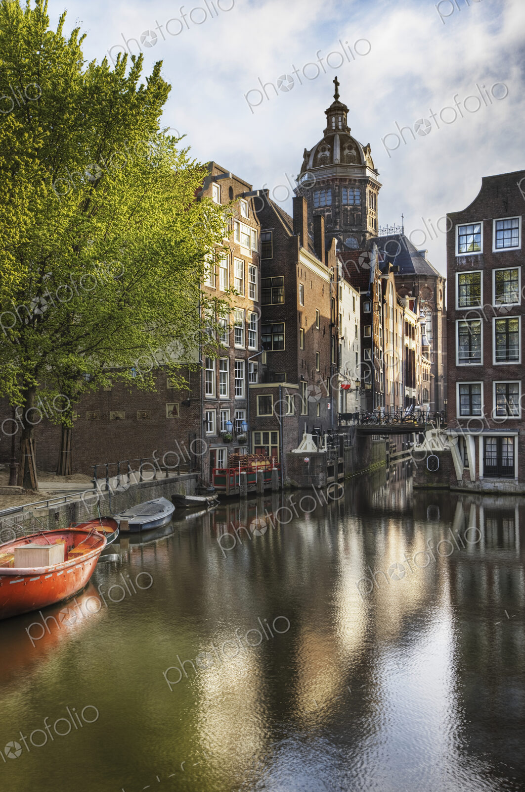 Historic Buildings and Canal in Amsterdam