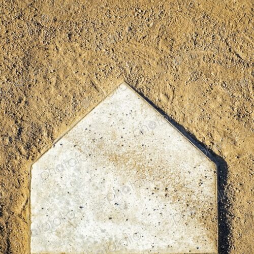Home Plate on Baseball Field covered with dirt, top view
