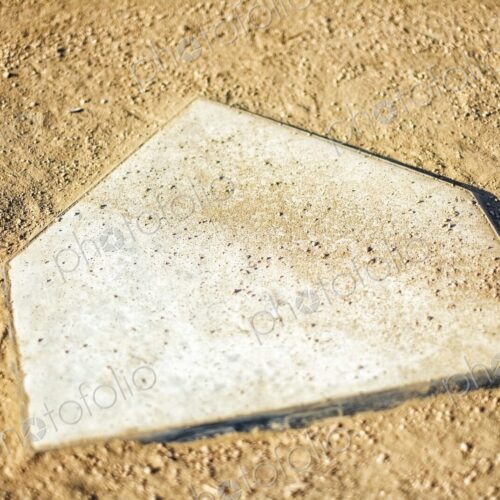 Home Plate on Baseball Field covered with dirt, top view Home Plate on Baseball Field covered with dirt, top view