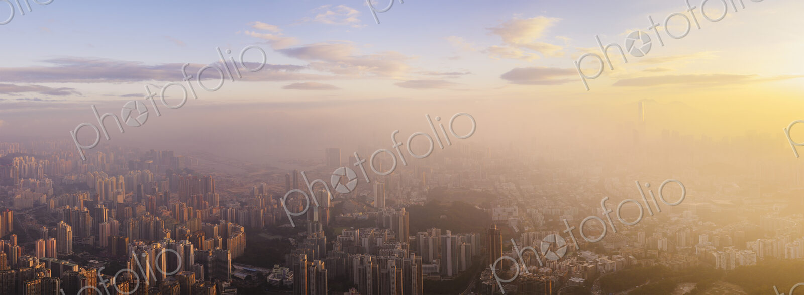 Hong Kong at sunrise with mist.