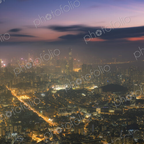 Hong Kong city lit up at night. Hong Kong city lit up at night.