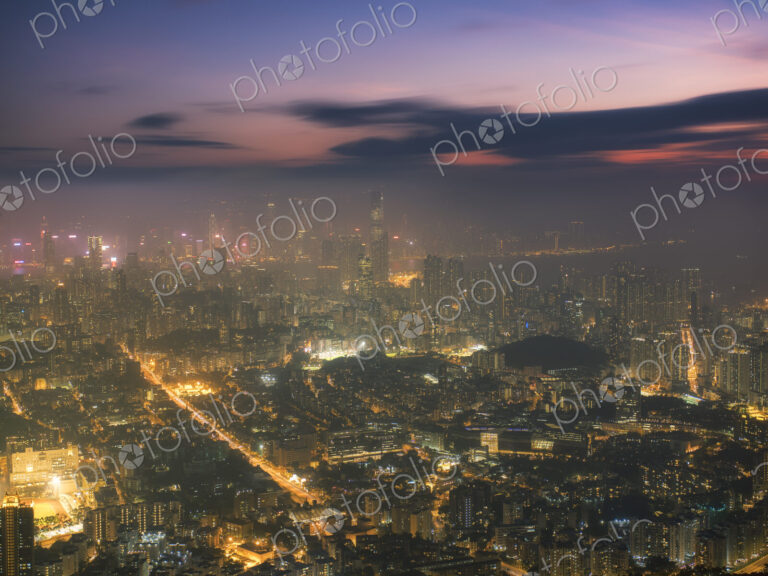 Hong Kong city lit up at night.