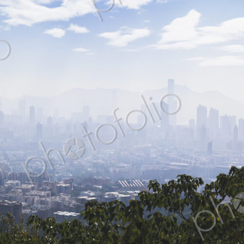 Hong Kong city seen in fog or mist.