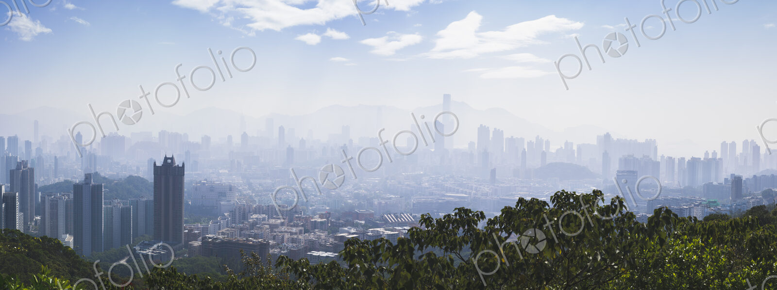 Hong Kong city seen in fog or mist.