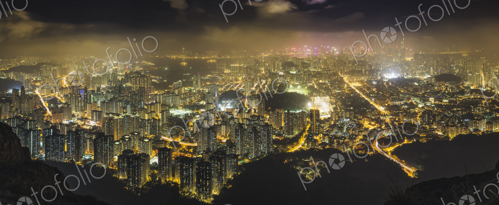 Hong Kong island seen from the hills, lit up at night.
