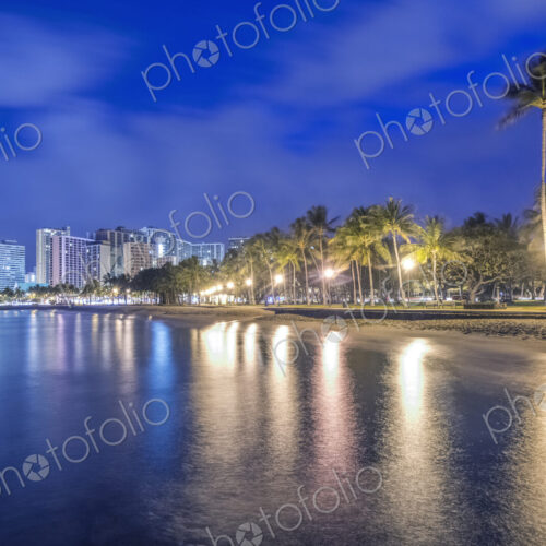 Honolulu city skyline reflection in ocean, Hawaii, United States Honolulu city skyline reflection in ocean, Hawaii, United States