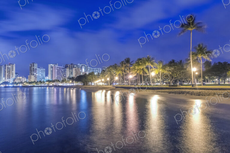 Honolulu city skyline reflection in ocean, Hawaii, United States
