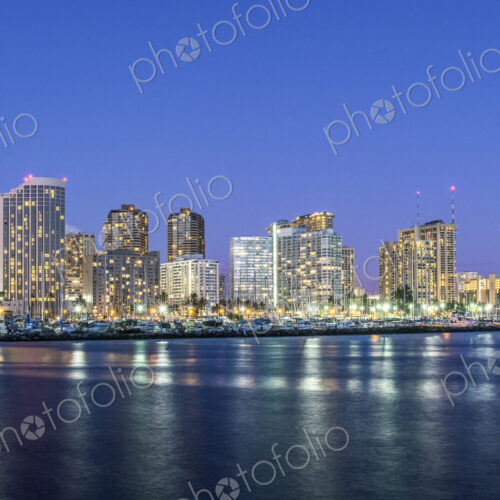 Honolulu city skyline reflection in ocean, Hawaii, United States Honolulu city skyline reflection in ocean, Hawaii, United States