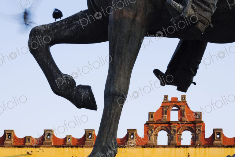 Horse Sculpture Detail with Building in Background