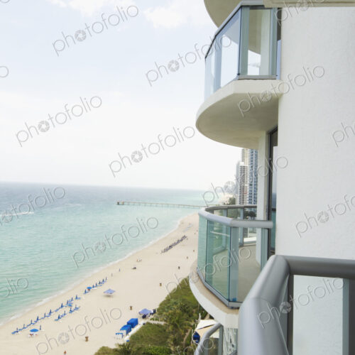 Hotel balcony overlooking urban beach Hotel balcony overlooking urban beach