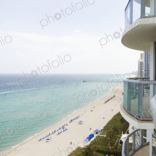 Hotel balcony overlooking urban beach Hotel balcony overlooking urban beach