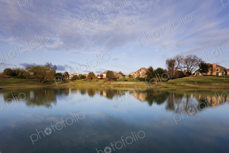 Houses Reflected in Pond