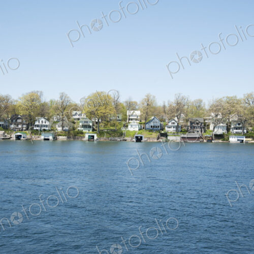 Houses on St. Lawrence River in Thousand Islands. Houses on St. Lawrence River in Thousand Islands.