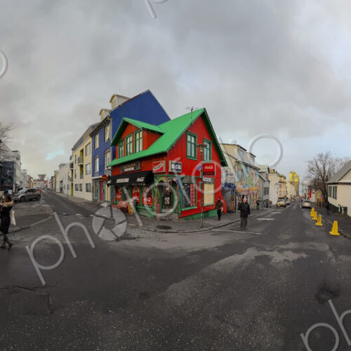 Houses on a street corner in Reykjavik, colourful paintwork and roofs, a stormy cloudy… Houses on a street corner in Reykjavik, colourful paintwork and roofs, a stormy cloudy…