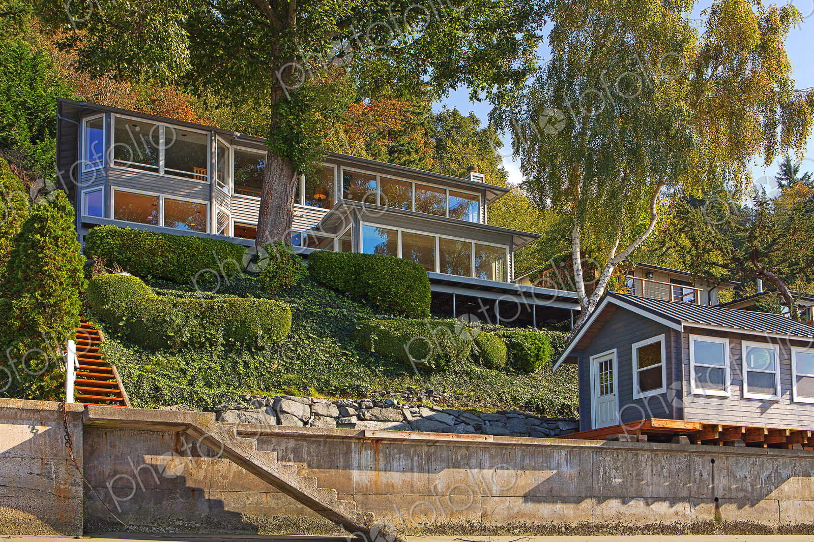 Houses on hillside at waterfront