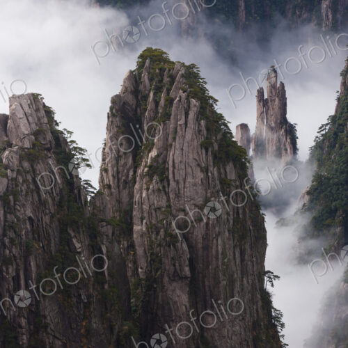 Huang Shan, which means Yellow Mountain. Anhui Provice in China. Jagged rock towers. Huang Shan, which means Yellow Mountain. Anhui Provice in China. Jagged rock towers.