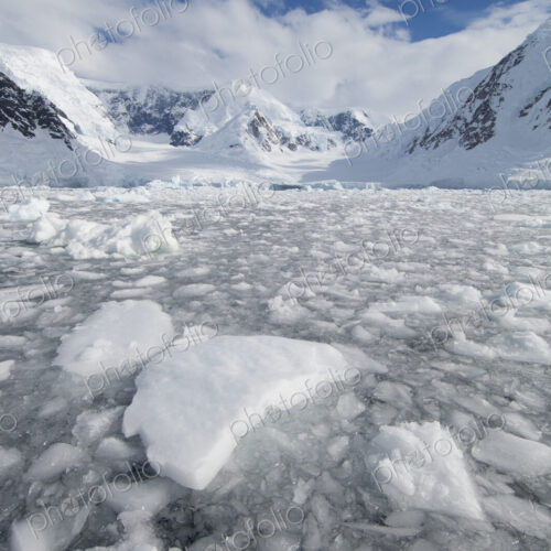 Ice at the base of a glacier in Wilhelmina Bay, Antarctica. Ice at the base of a glacier in Wilhelmina Bay, Antarctica.