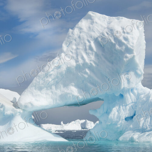 Icebergs floating on the Antarctic southern oceans. Eroded by wind and weather,… Icebergs floating on the Antarctic southern oceans. Eroded by wind and weather,…