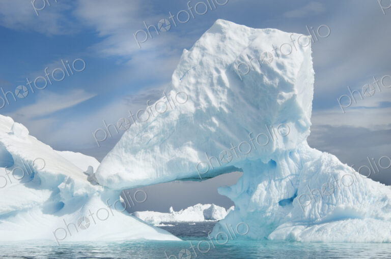 Icebergs floating on the Antarctic southern oceans. Eroded by wind and weather,…