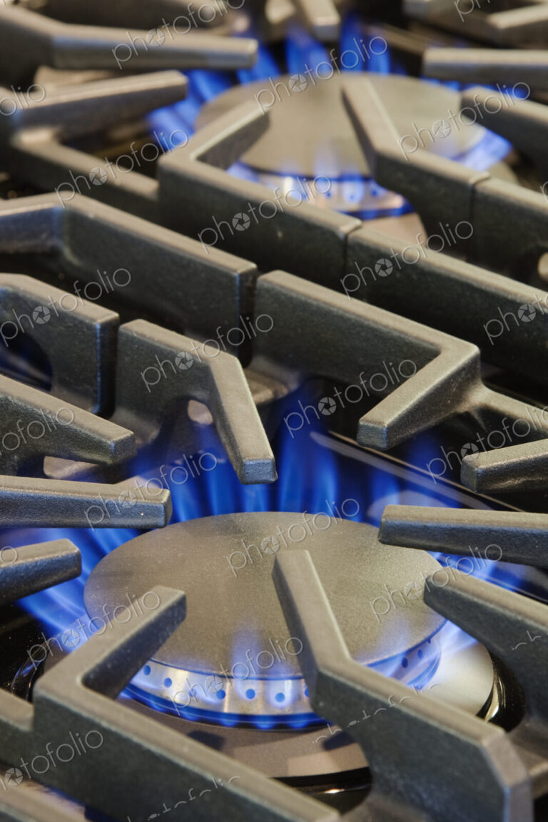 Ignited Gas Burning on Commercial Stove