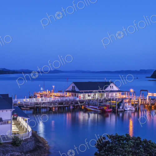 Illuminated building on water at dawn Illuminated building on water at dawn