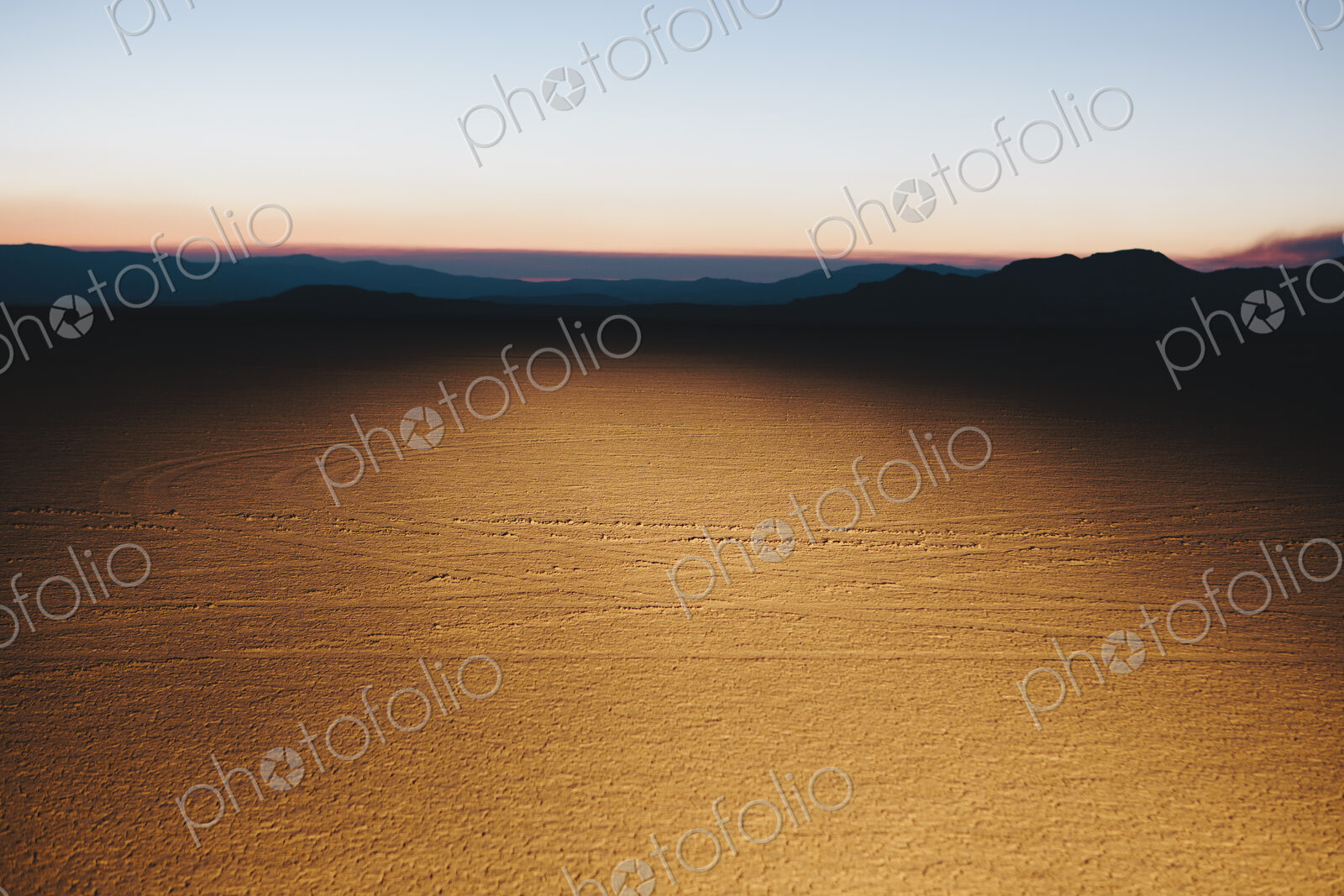 Illuminated desert landscape, dusk