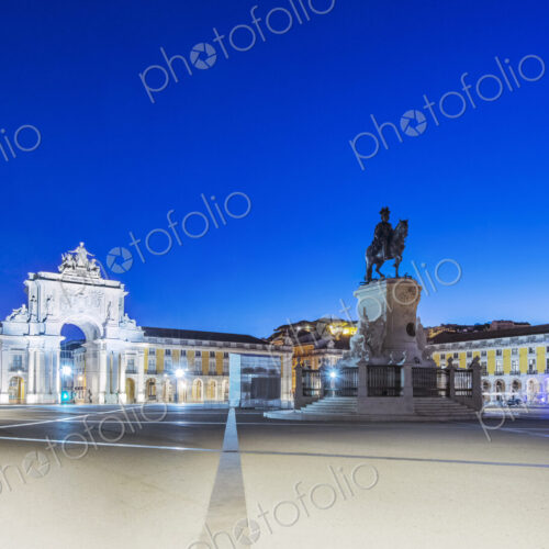 Illuminated fountain and ornate buildings in Commerce Square, Lisbon, Lisbon, Portugal Illuminated fountain and ornate buildings in Commerce Square, Lisbon, Lisbon, Portugal
