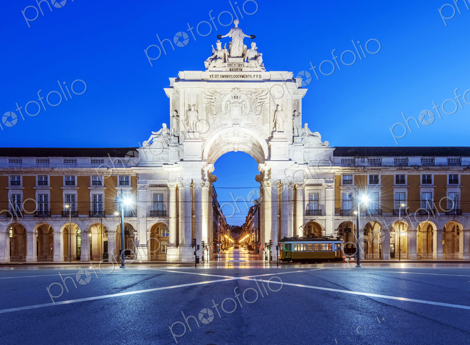 Illuminated ornate archway in Commerce Square, Lisbon, Lisbon, Portugal