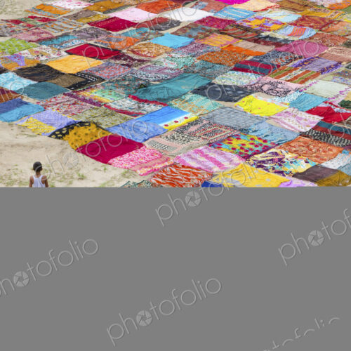 India, Agra, drying washed sari s in the sun. India, Agra, drying washed sari s in the sun.