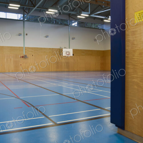 Indoor basketball court, epmpty gym, Sign on wall banning food or drink in gym