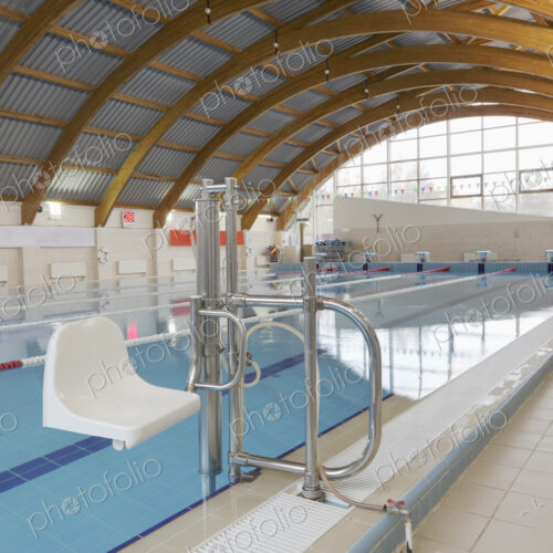 Indoor swimming pool, a chair and hoist for disabled people. Indoor swimming pool, a chair and hoist for disabled people.